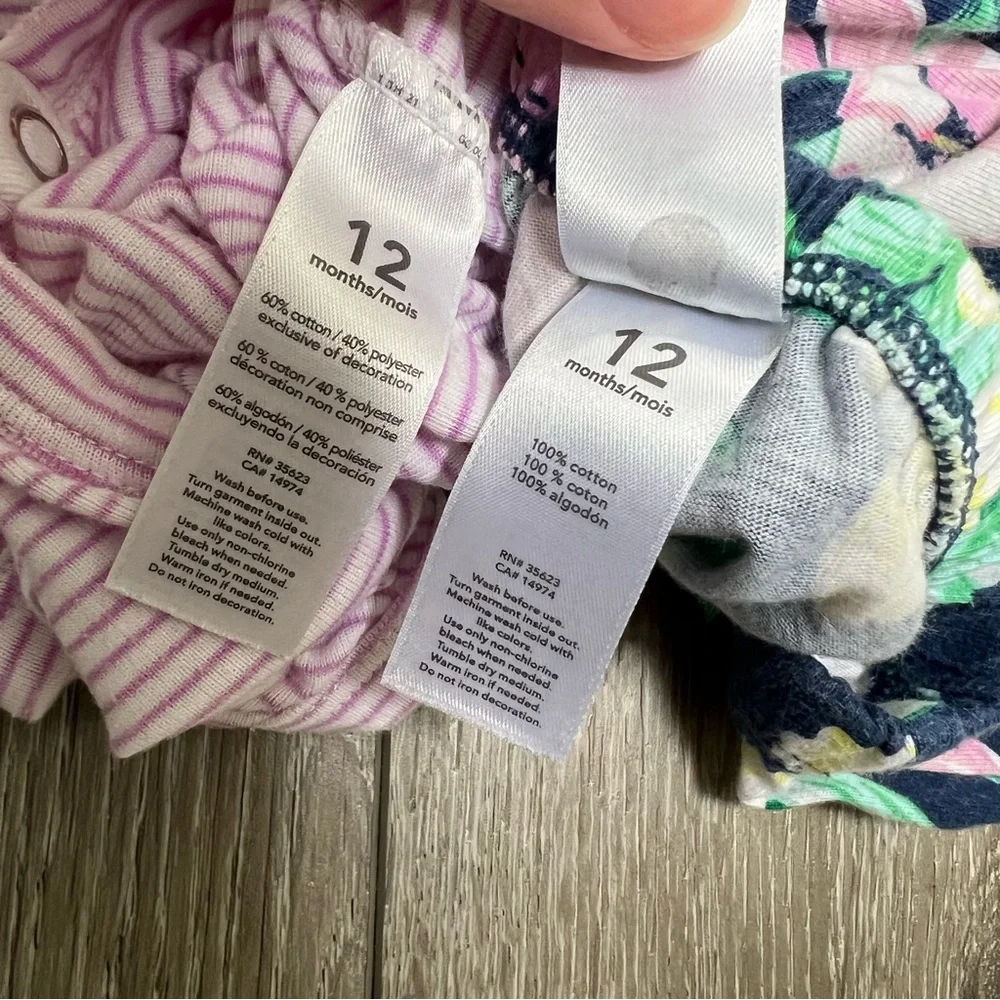 CARTERS 2PC SLEEVELESS BODYSUIT AND SHORTS SET PURPLE 12MO